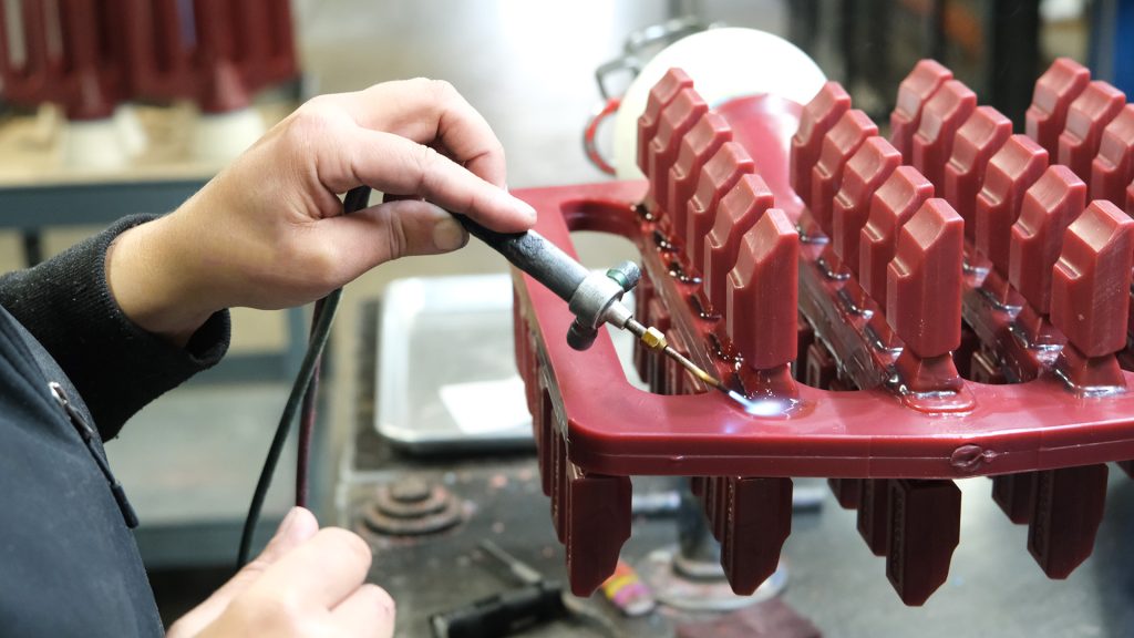 Wax room: attaching wax patterns to sprue